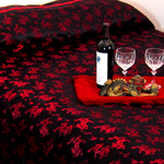 Black and red dragon silk bedspread.